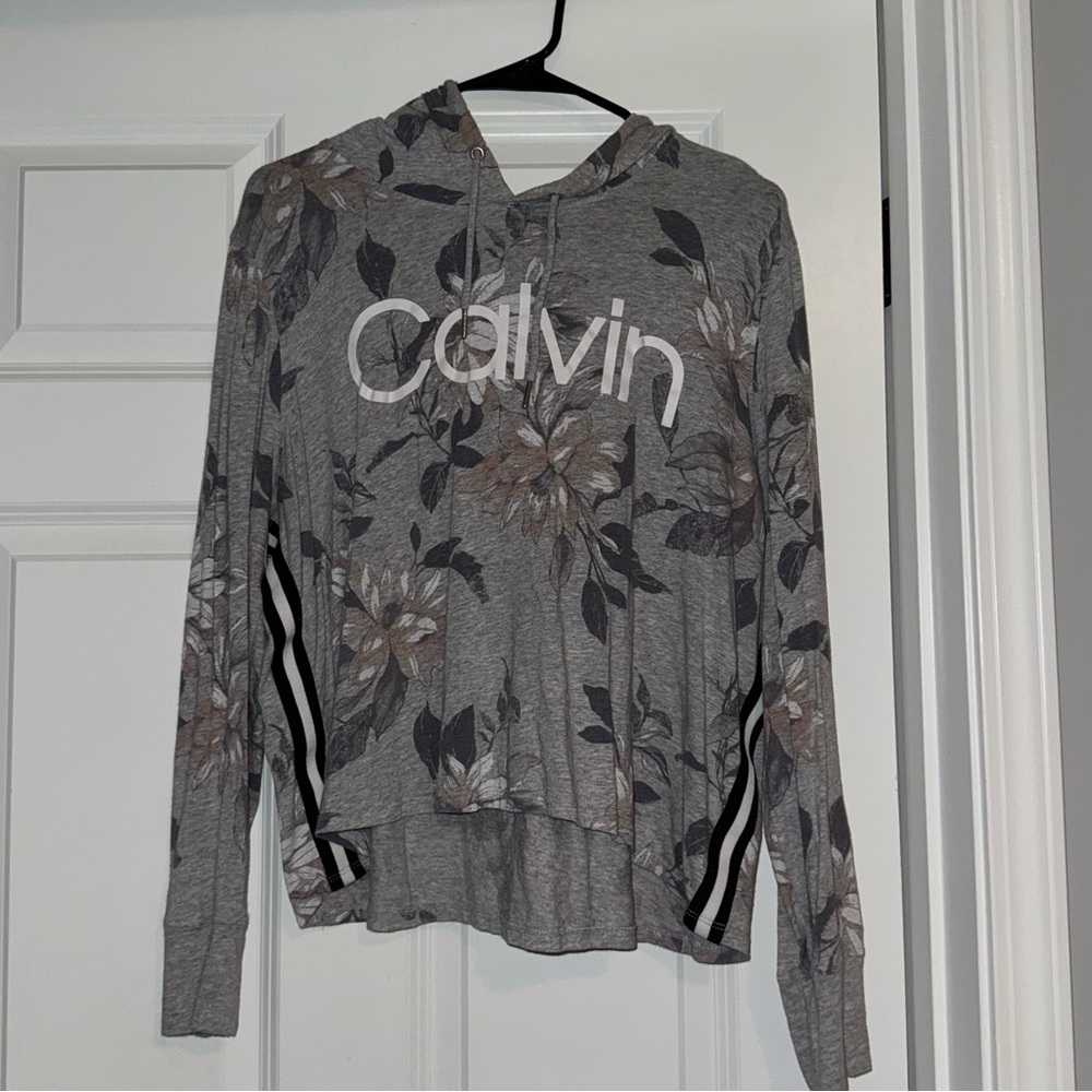 Floral Calvin Klein performace hooded shirt, like new. Xl.